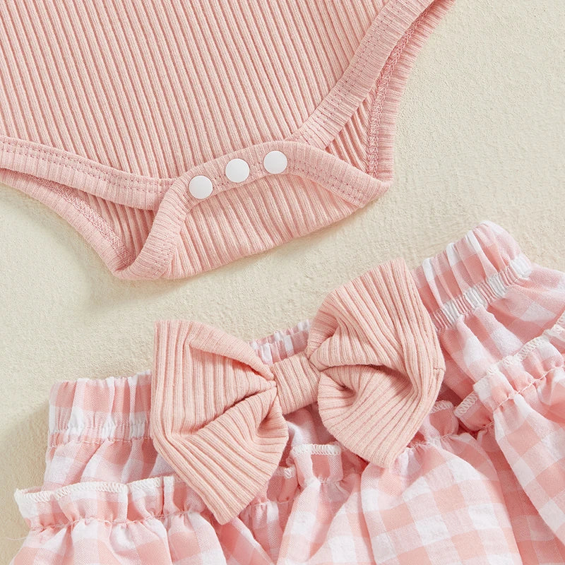 Pink ribbed bodysuit with snaps and matching gingham ruffled shorts with a bow for Auntie's Bestie Ruffle Set.