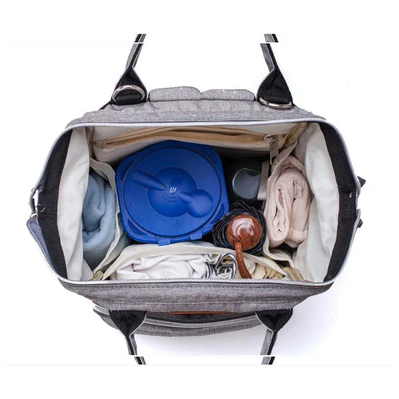 Interior view of LeQueen Quilted Nappy Backpack showcasing its spacious compartments and organised interior.