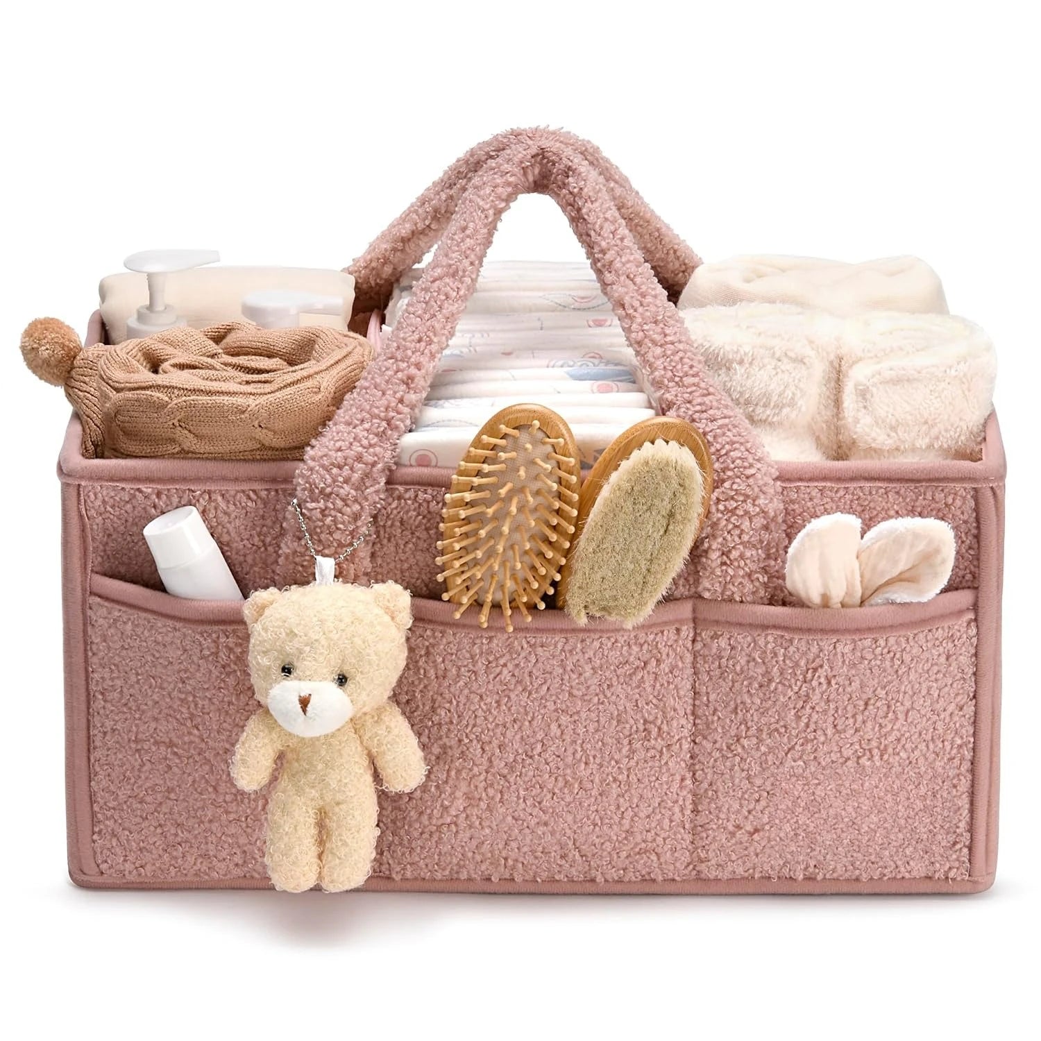 Plush Pink Nappy Caddy filled with baby essentials, featuring soft fabric and organised compartments for nursery clutter-free storage.