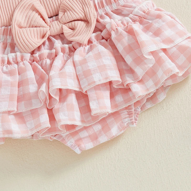 Pink gingham ruffled shorts with a bow, part of the Auntie's Bestie Ruffle Set for baby girls.