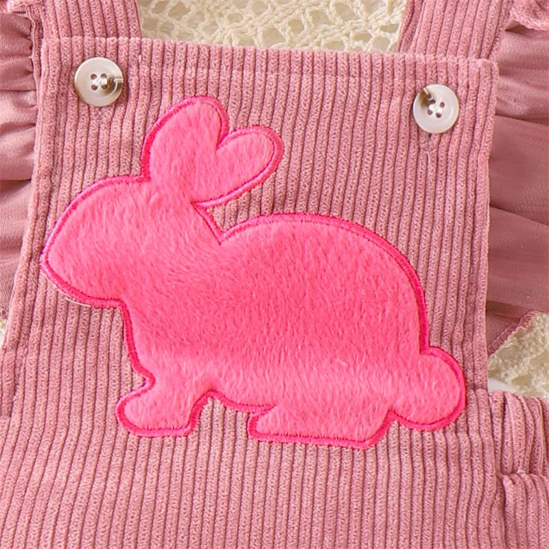 Close-up of bright pink bunny appliqué on Pink Bunny Corduroy Romper, perfect for baby Easter outfits.