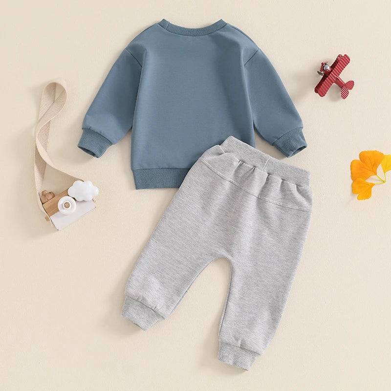 A Little Dirt Never Hurt toddler outfit set in blue and grey - rear view