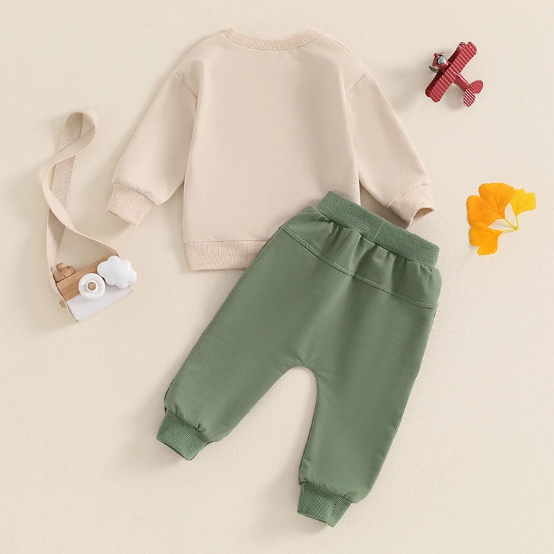 A Little Dirt Never Hurt toddler outfit set in green - rear view