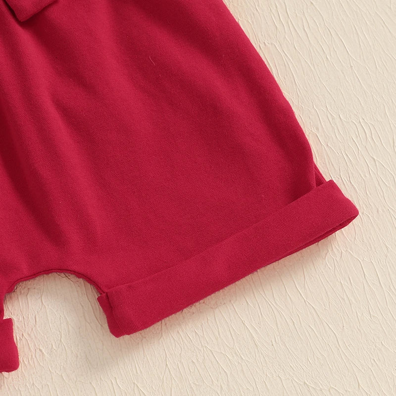 Baby boy first birthday outfit - closeup of red shorts
