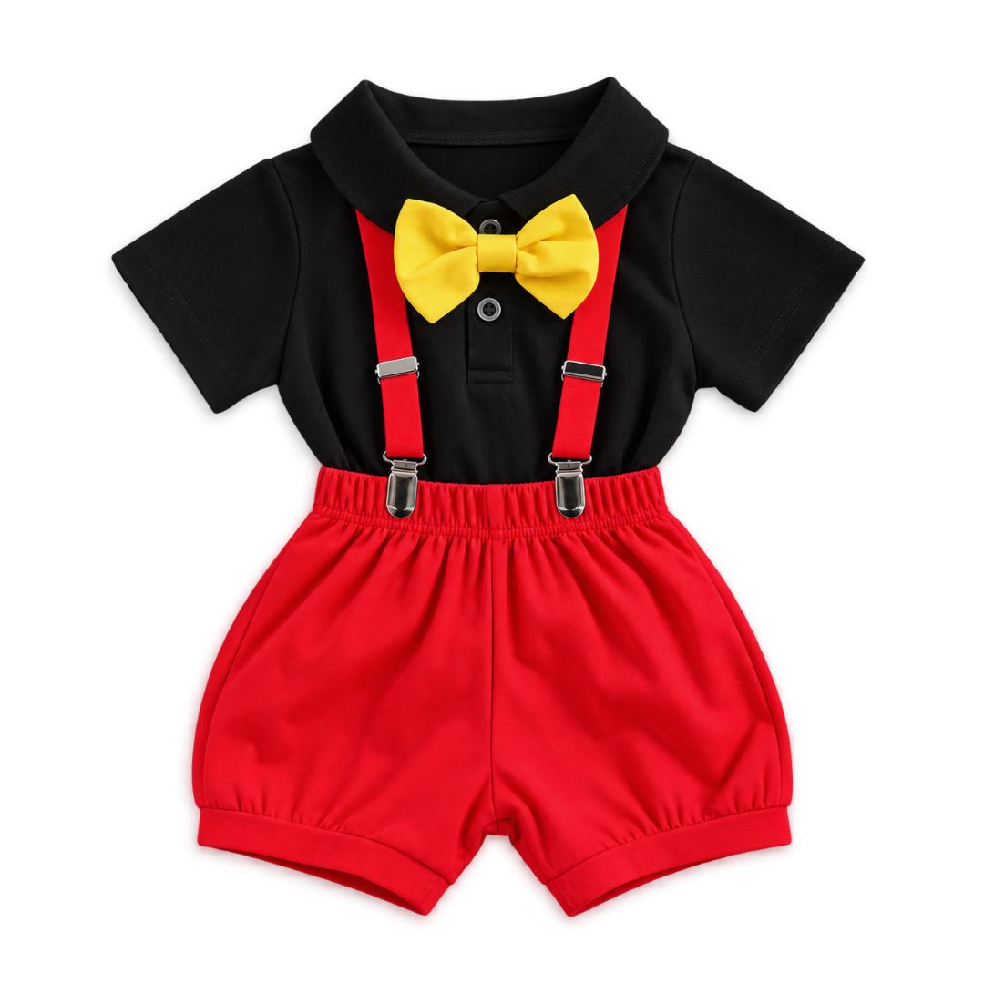 Baby boy birthday outfit featuring a black collared romper, red suspender shorts, and a bright yellow bow tie