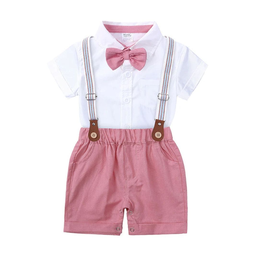 Baby boy formal outfit including collared onesie with bow tie, pink shorts and suspenders