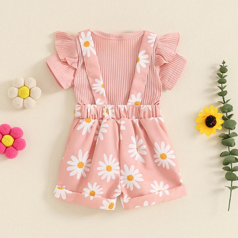Back view of daisy overalls set featuring a ribbed bodysuit and daisy-print overalls in pink