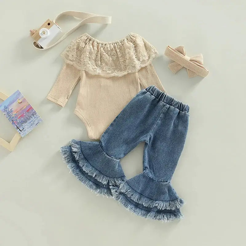 Back view of Boho baby girl outfit set with beige lace romper and flared jeans