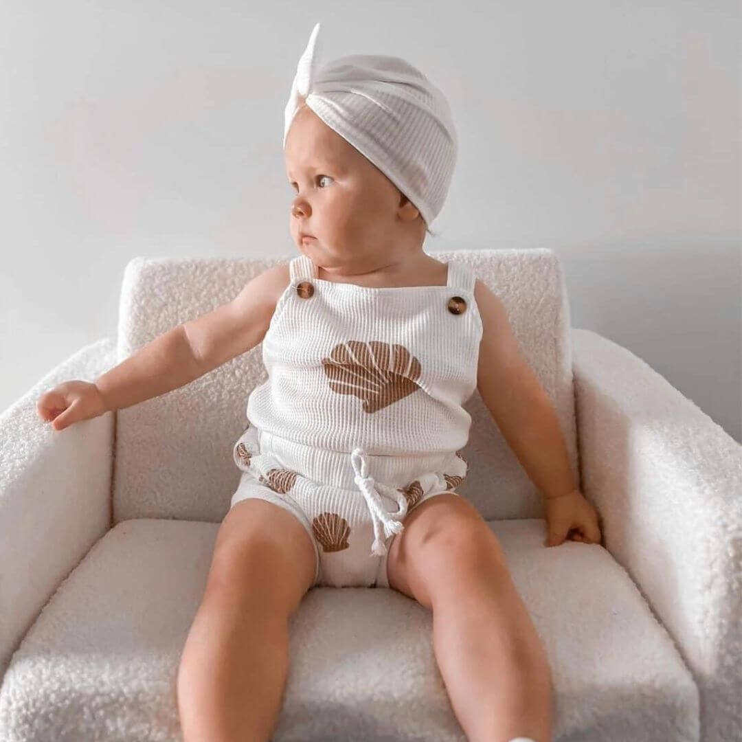 Baby girl wearing Seashell Waffle Shorts Outfit and turban