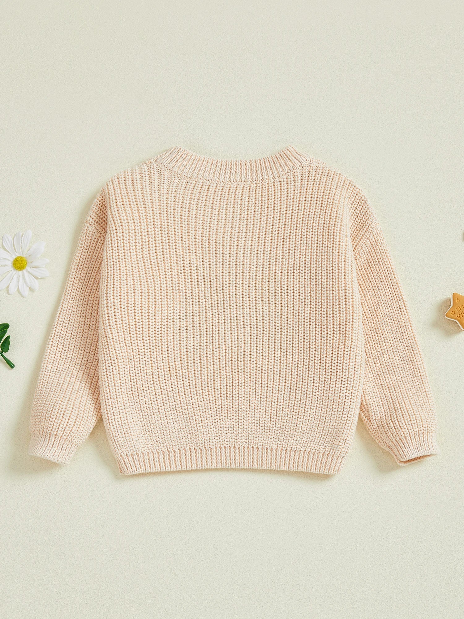 Back view of toddler tractor knit jumper