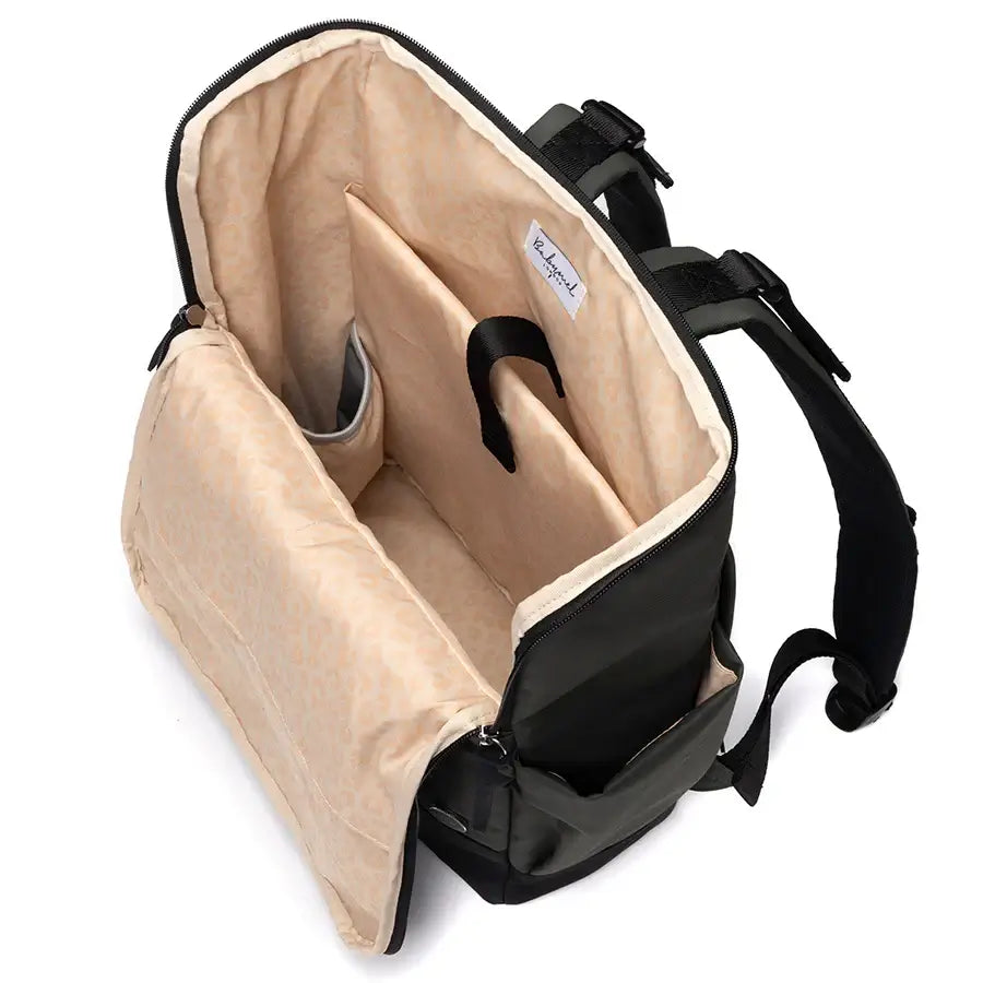 Interior view of the Babymel Finn nappy backpack, featuring spacious compartments and a sleek design.