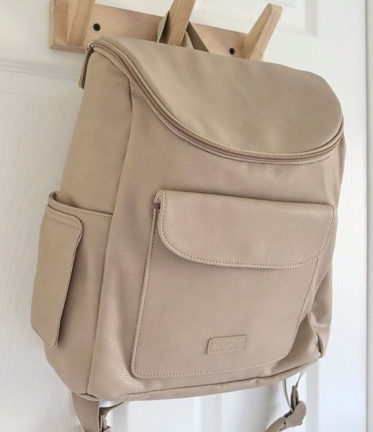 Babymel Lennox nappy bag backpack in oat, hanging up