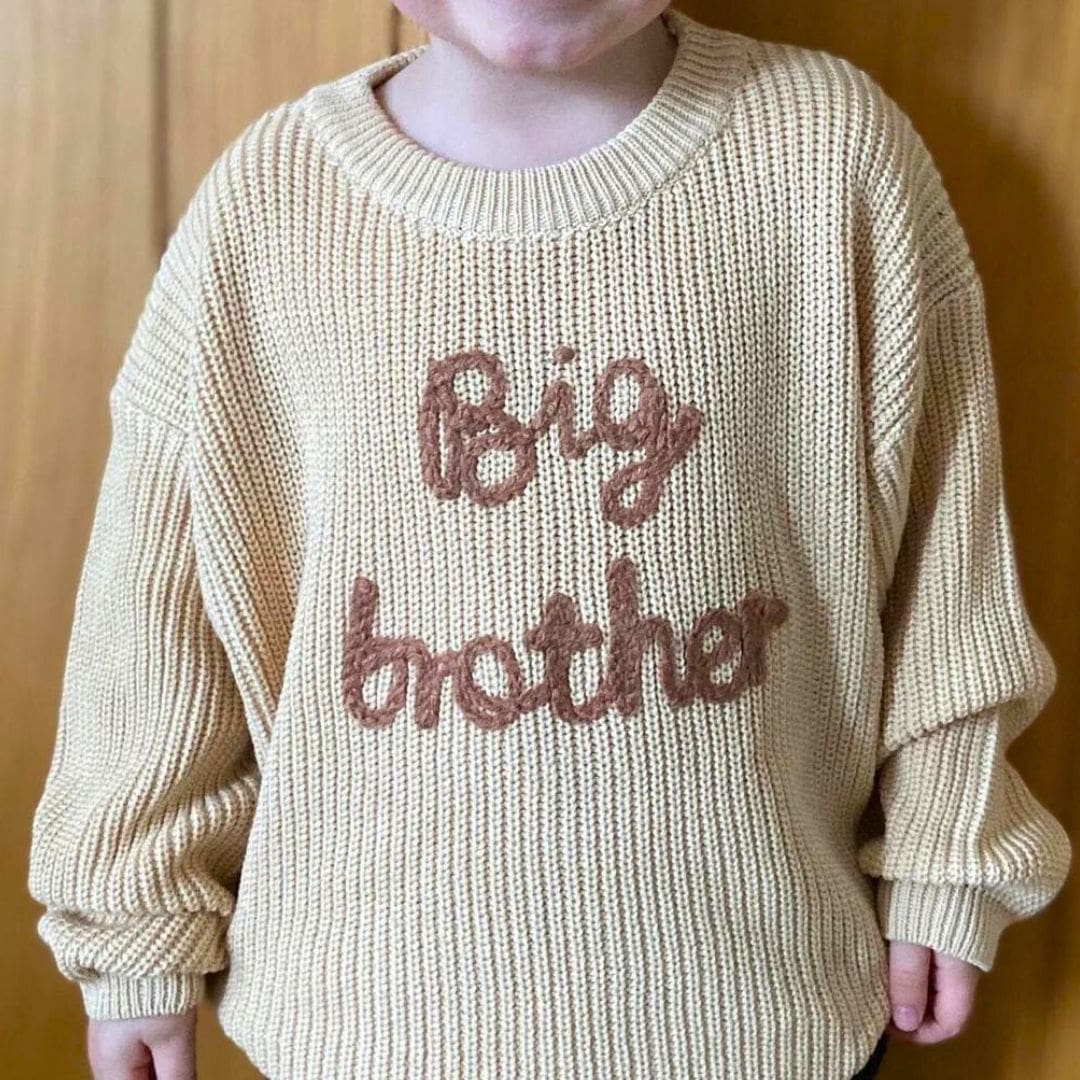 Boy wearing Big Brother Jumper in beige knit