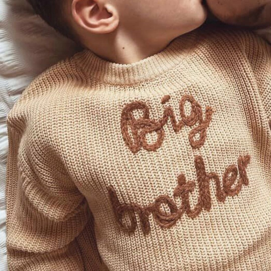 Boy wearing Big Brother Jumper in beige knit