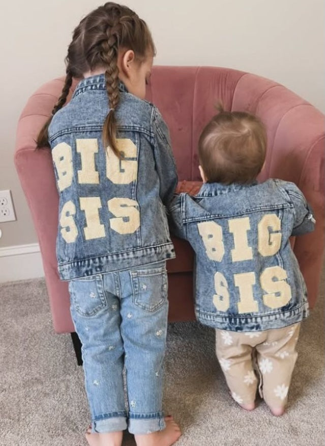 Sisters wearing Big Sis Denim Jackets