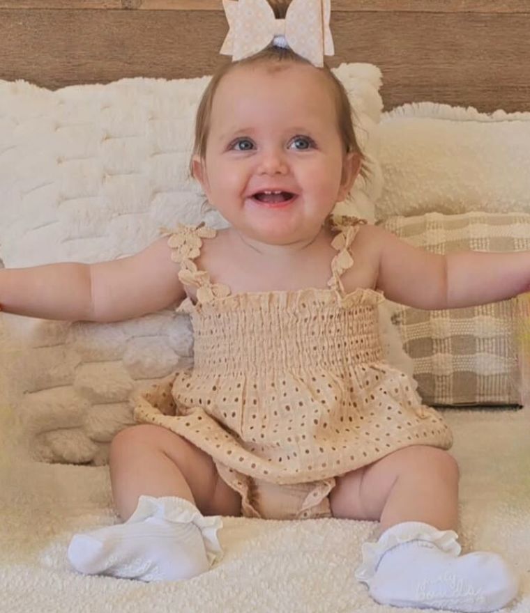 Baby girl modelling Celeste boho lace outfit in beige - Lulu Babe