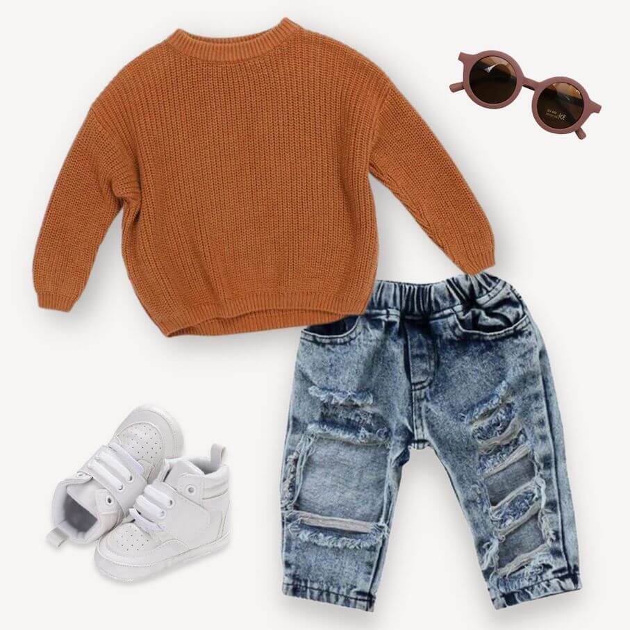 Toddler outfit idea - cinnaon knitted jumper paired with jeans, sneakers and sunglasses