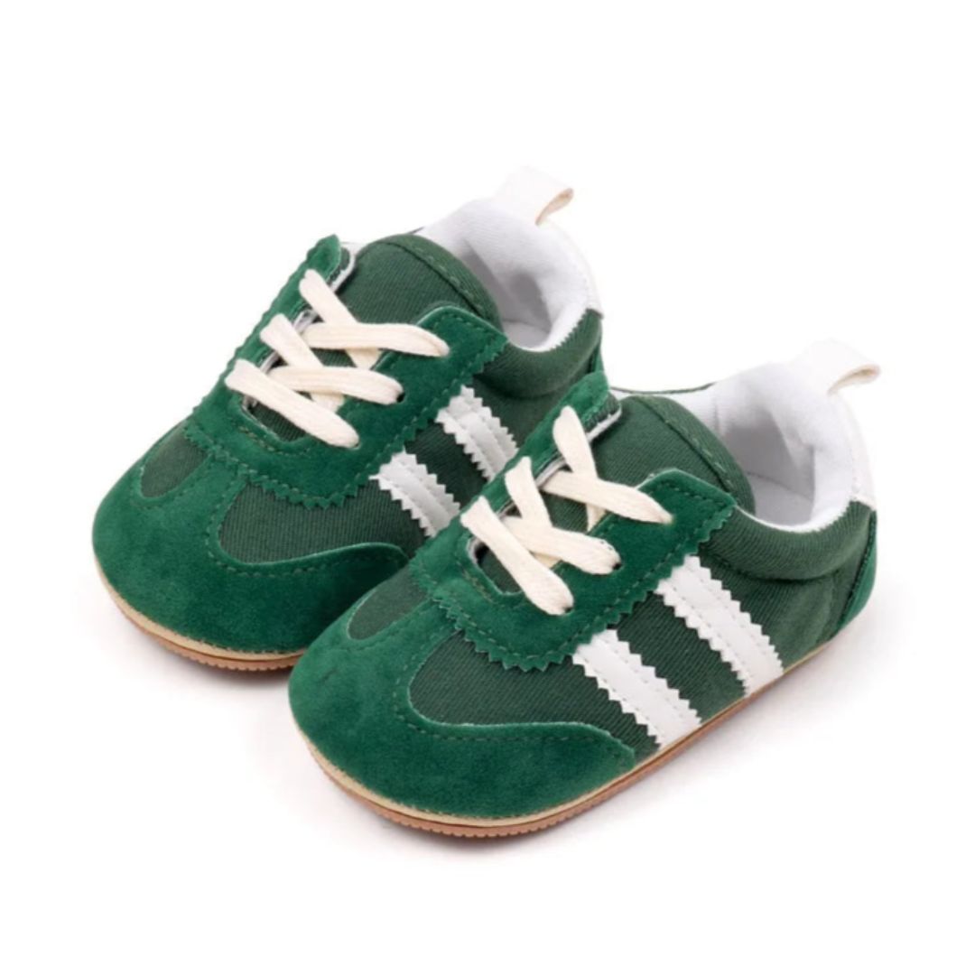 Forest green baby sneakers with white stripes and soft sole for pre-walkers