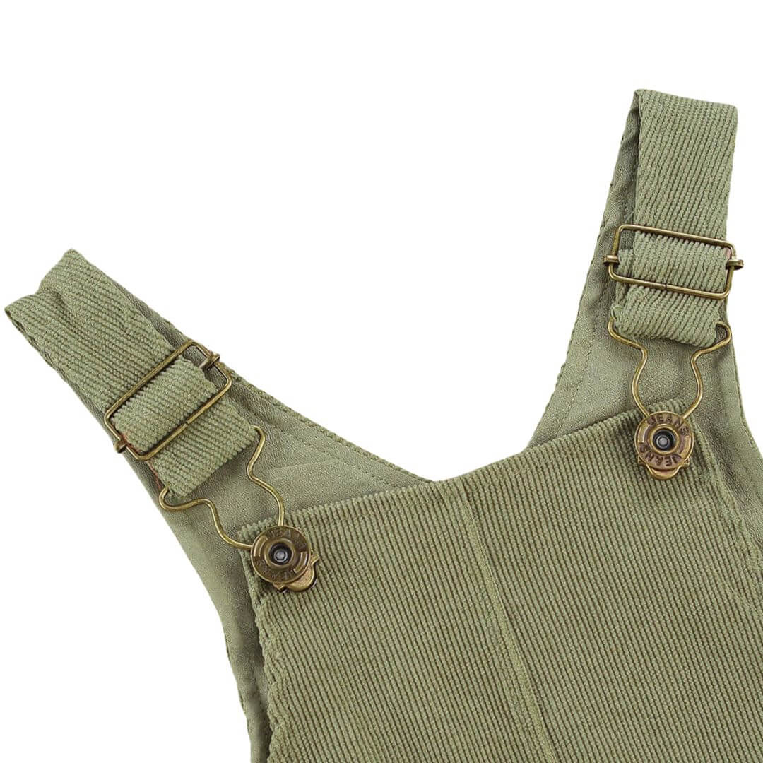 Closeup of corduroy Baby Overalls in green with adjustable straps