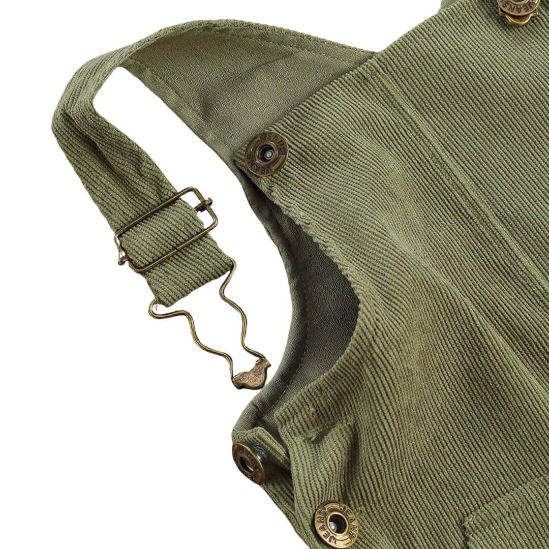 Closeup of corduroy Baby Overalls in green