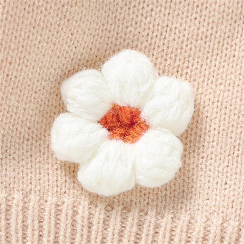 Close-up of beige daisy floral cardigan for baby & toddler girls