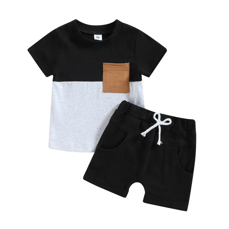 Fynn Colour Block Shorts Set for boys featuring a black and grey T-shirt with a contrast pocket and matching black shorts.