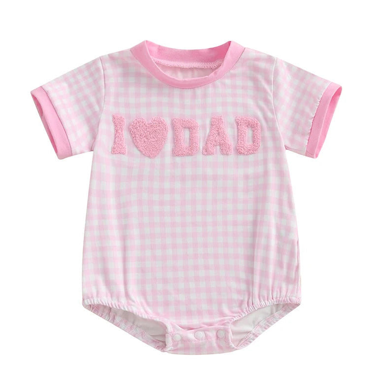 Pink checkered baby romper with 'I ❤️ DAD' text on a white background - Father's Day baby gift