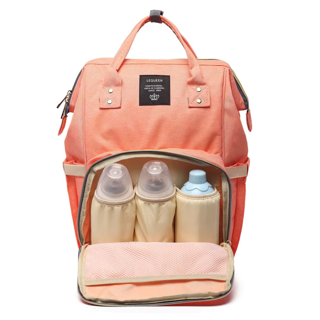 LeQueen Nappy Bag in coral, showing the 3 insulated bottle holder pockets.