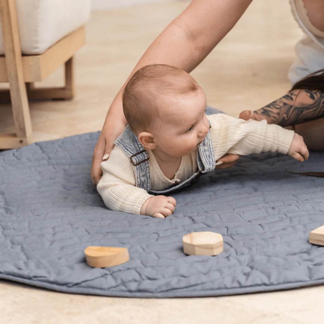 Baby playing on Linen Play Mat in French blue | Waterproof & Washable - Lulu Babe
