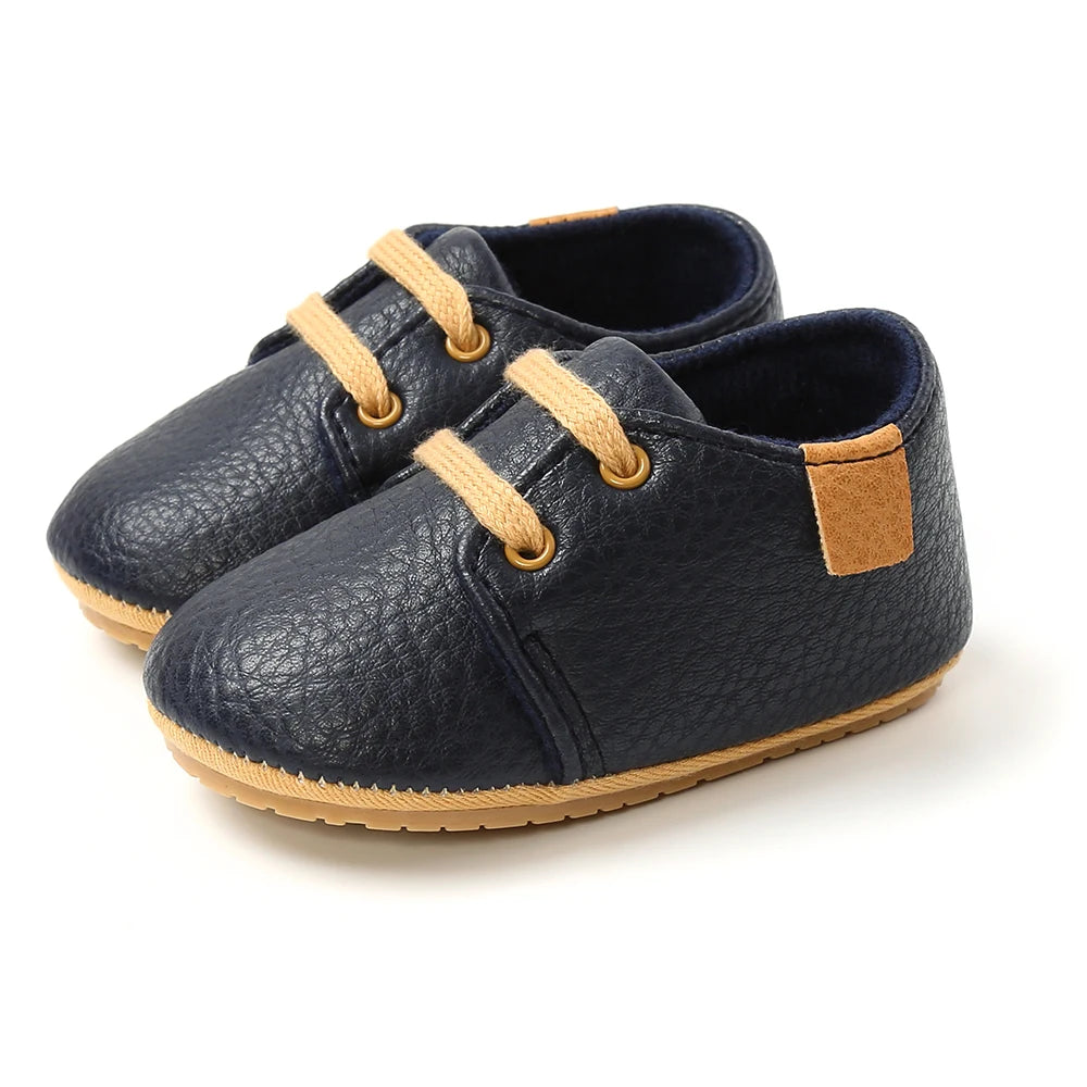 Navy lace-up oxford style baby shoes