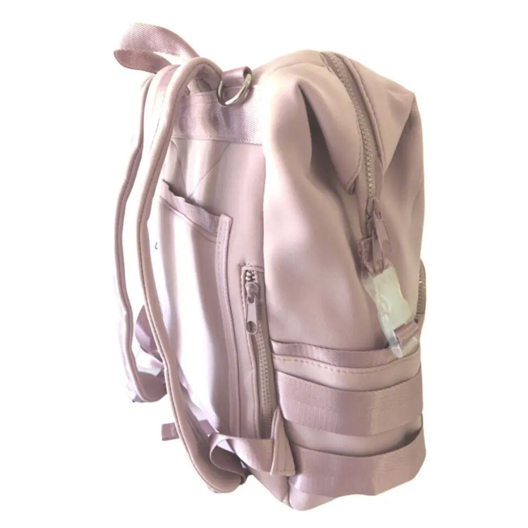 Neoprene Nappy Backpack in blush pink - side view