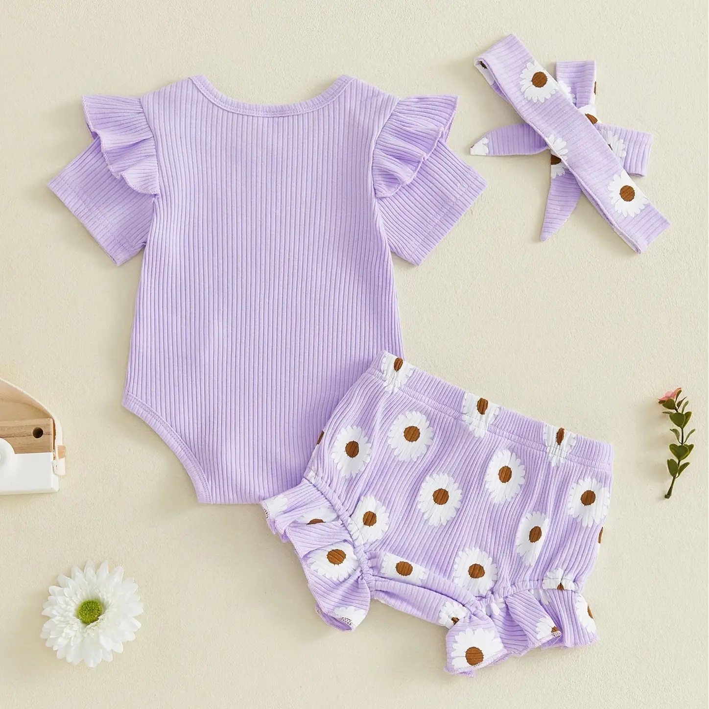 Back view of lilac baby girl outfit - "I'm New Here"