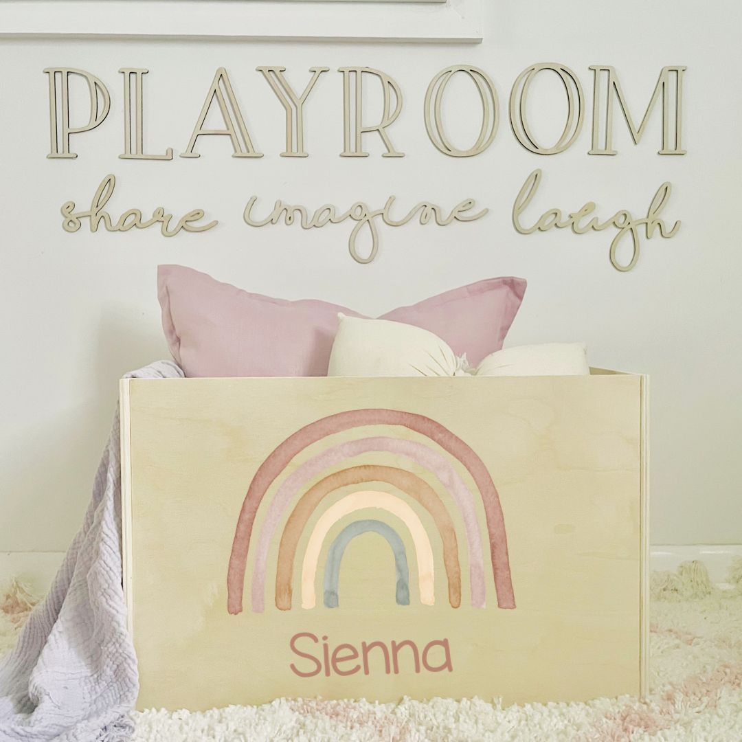 Personalised Wooden Toy Box with rainbow design and custom name, perfect for children's playrooms