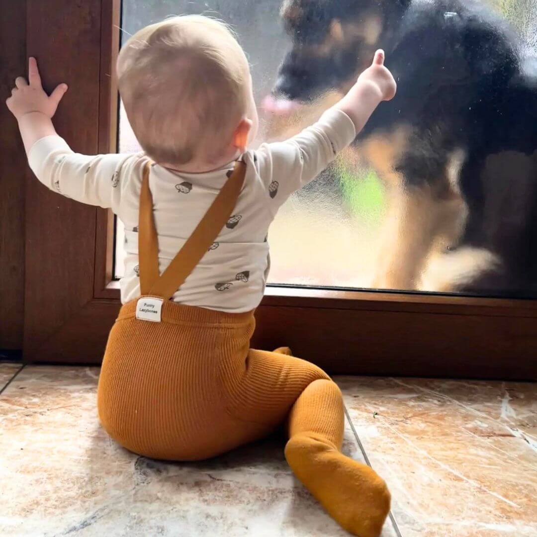 Baby wearing ribbed suspender tights in mustard - Lulu Babe