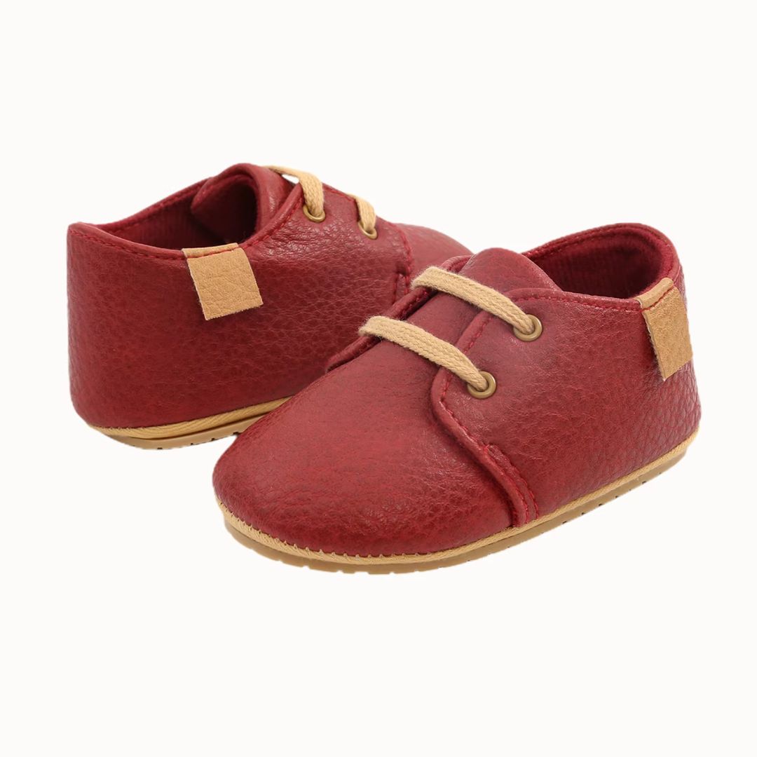 Oxford style baby shoes in rust with laces and non-slip soles
