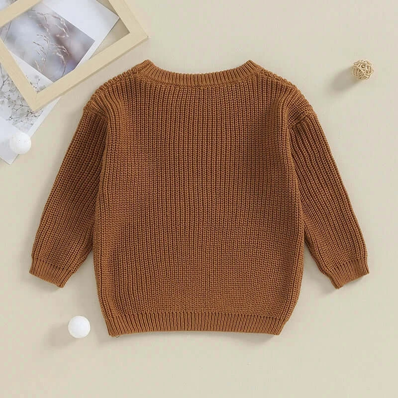 Matching sibling knitted jumper in chocolate brown flatlay showing back view