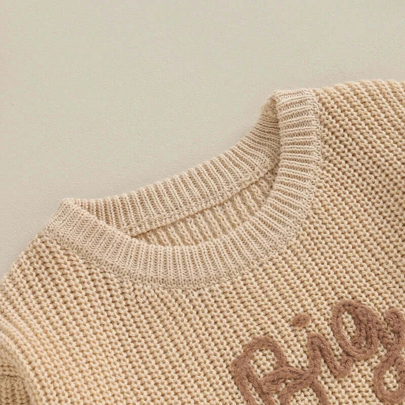 Close-up of Big Brother knit jumper in beige