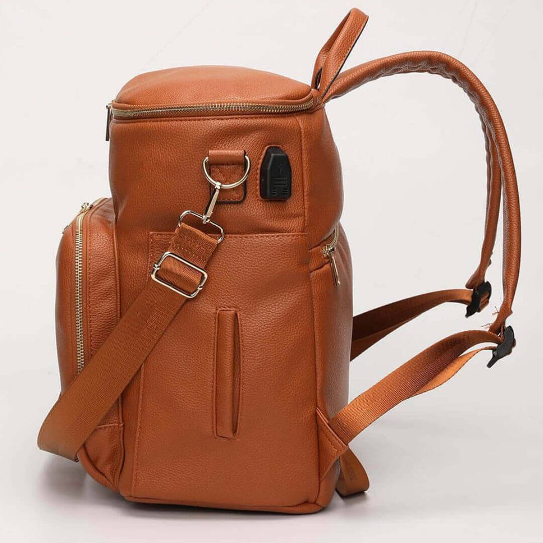 Sofia baby backpack tan backpack - side view with wipes pocket and USB