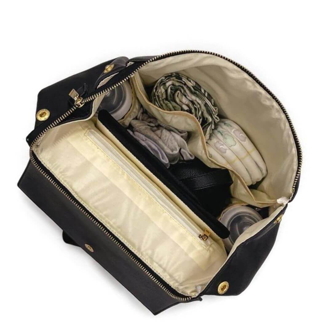 Interior view of Soho nappy backpack showing straps showing organised compartments