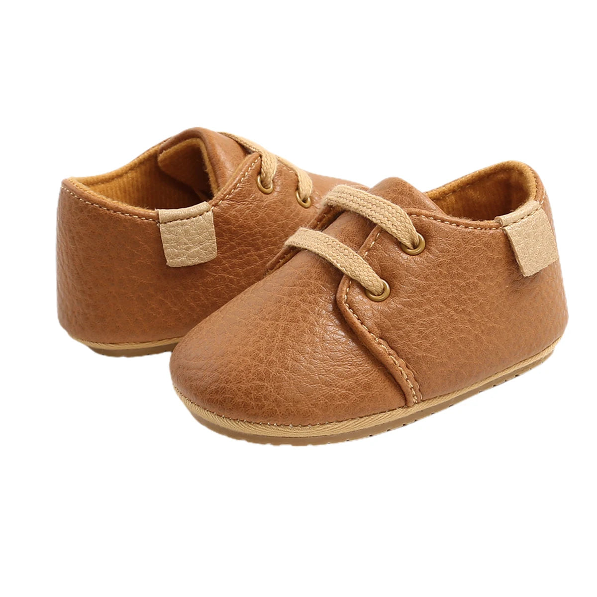 Tan lace-up oxford style baby shoes