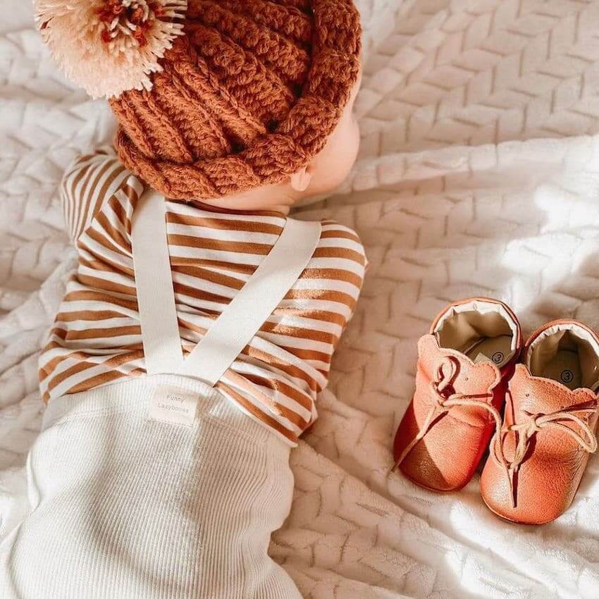 Baby next to Baby Bear Shoes from Lulu Babe (in 0-6 months, 6-12 months & 12-18 months)