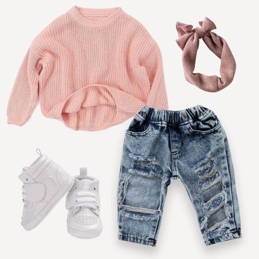 Toddler outfit idea - pink knitted jumper paired with jeans, white sneakers and knit headband