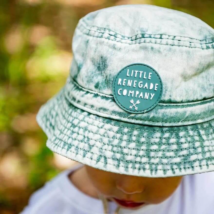 Lifestyle image of green denim bucket hat by Little Renegade Company