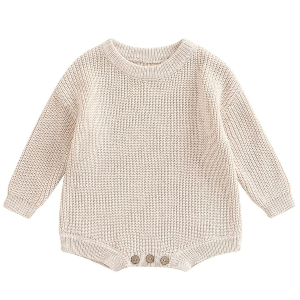 Knit baby romper in sand, featuring long sleeves and button details, perfect for winter