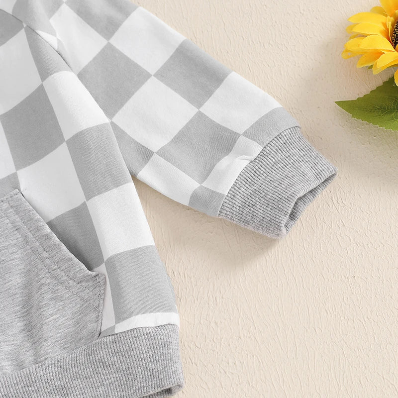 Close-up of the grey check print sleeve of the Check Baby Hoodie 