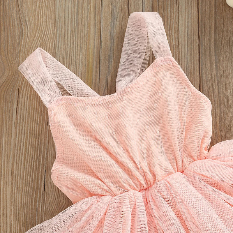 Ballerina Baby Girl Tutu Romper with soft dotted bodice and tulle skirt showcasing adjustable straps.