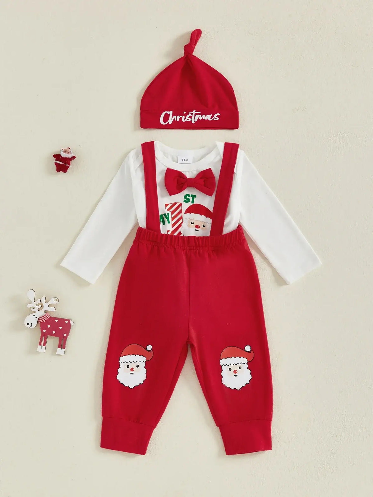 My 1st Christmas suspender set for baby boy, featuring red festive overalls, long-sleeve bodysuit and matching beanie.