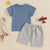 Big brother outfit incldues dusty blue t-shirt and grey shorts