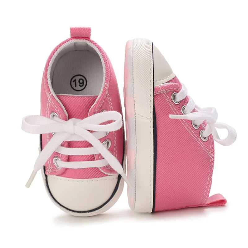 Pink lace-up canvas baby sneakers