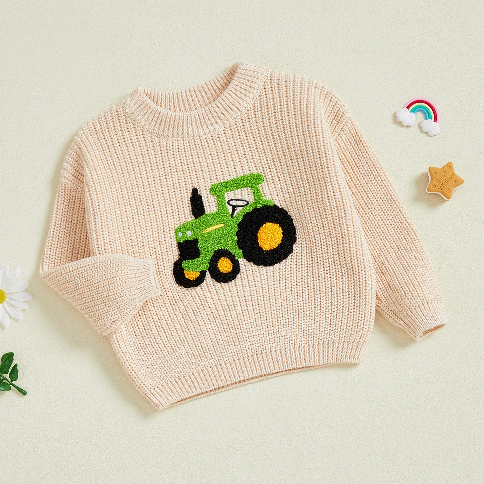 Cream chunky knit baby jumper with large green and yellow chenille tractor appliqué 